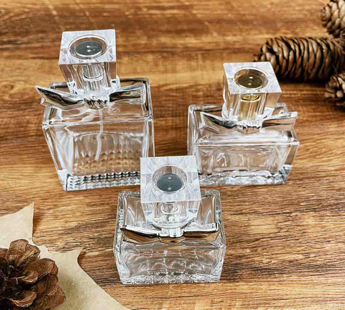 Square perfume bottles with bowknot caps