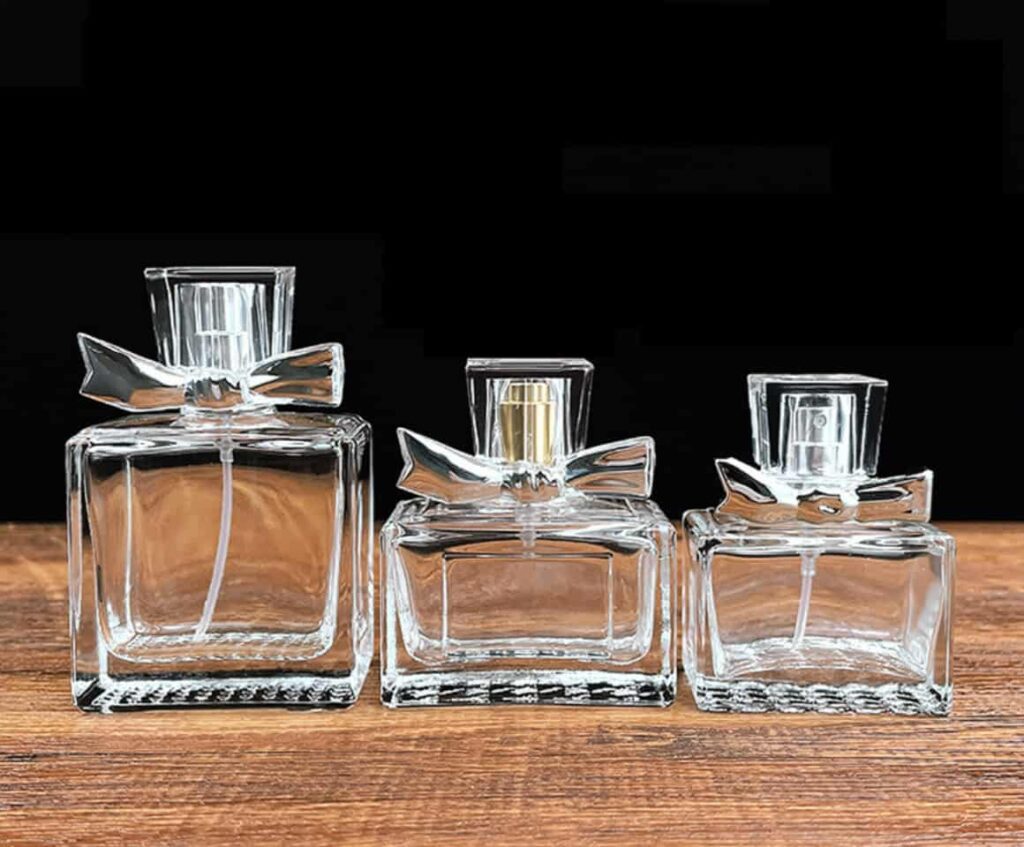 Square perfume bottles with bowknot caps 