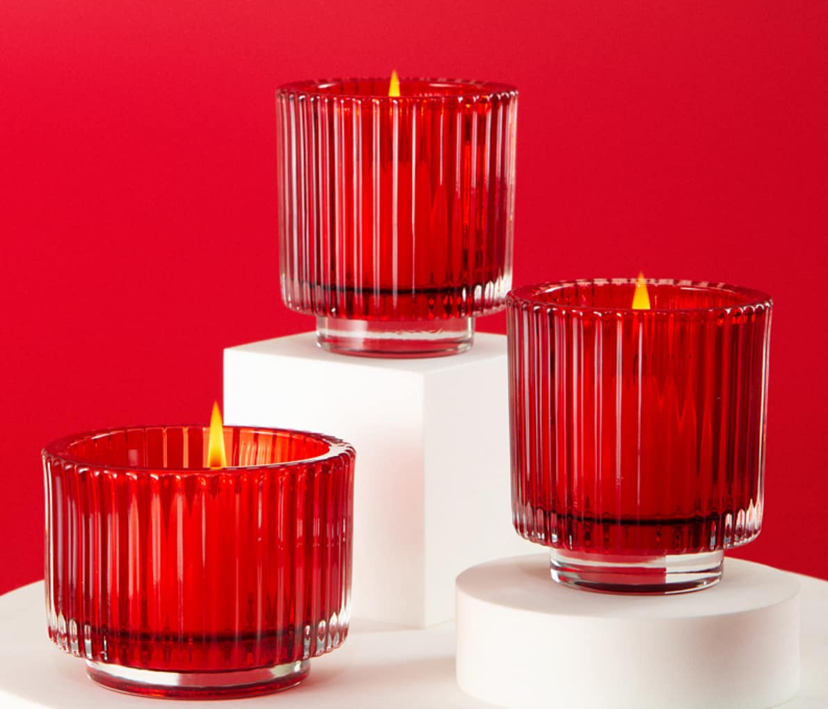 Vertical patterned glass candle jars red color